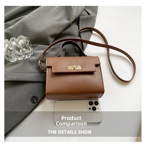 Brown cross-grain mini crossbody bag compared with a smartphone for size detail