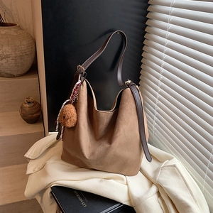Brown vintage suede tote bag with bear charm and large capacity for daily commuting