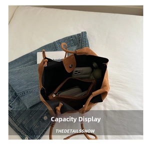 Interior view of brown suede bucket tote bag showing large capacity for daily essentials