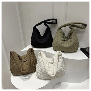 Quilted tote bags in black, green, brown, and cream with soft nylon padded texture