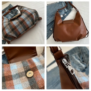Dettaglio della borsa tote vintage con patchwork in pelle marrone e chiusura magnetica