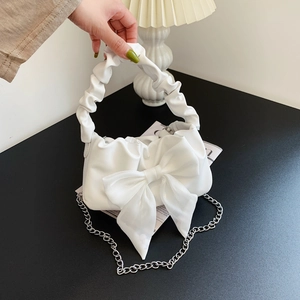 White retro cloud bag with large organza bow and metallic chain strap detail