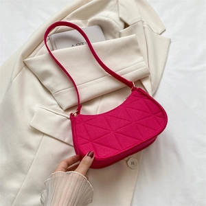 Vibrant rose pink quilted felt baguette shoulder bag with stylish geometric stitching
