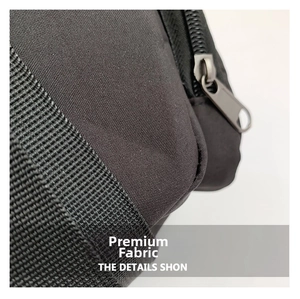 Close-up of durable black fabric texture with thick woven strap and matte metal zipper