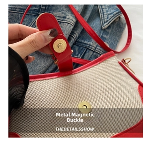 Detail of a chic shoulder bag featuring a beige woven texture and red leather trim closure