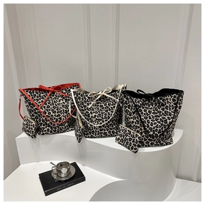Large leopard print canvas tote bag set with matching zipper pouches in three colors