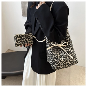 Leopard print canvas tote bag set with matching pouch and off-white woven handles