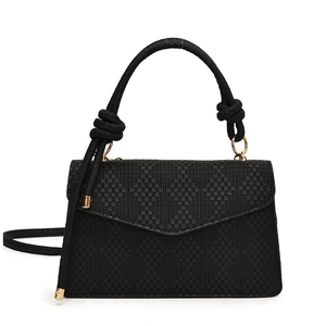 Elegant black woven small square handbag with knotted handle and gold hardware detail