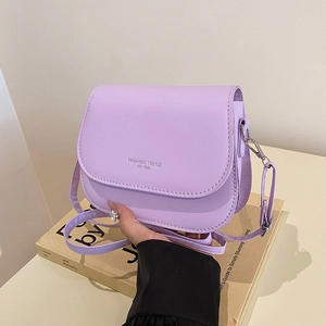 Handheld light purple PU leather crossbody saddle bag with Fashion Trend logo print
