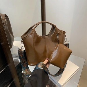 Brown oil wax leather tote bag with ethnic pattern wide strap for women daily commuting