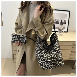 Detail of leopard print canvas tote bag set with matching small zipper coin pouch