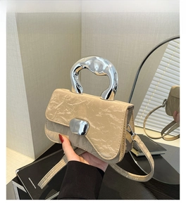 Chic khaki square handbag featuring a unique silver metallic handle and textured leather