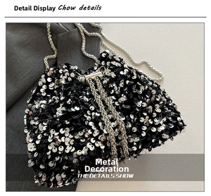 Detailed close-up of shiny silver sequins and metal drawstring on black bucket bag