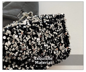 Macro detail of high-quality silver sequins on a stylish black crossbody bucket bag