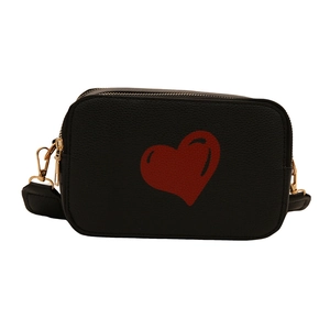 Black lychee leather crossbody bag with red heart print and gold zipper detail