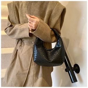 French style black woven hobo shoulder bag with crescent moon shape and braided texture