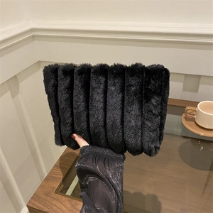 Chic black faux fur clutch bag with vertical quilted stripes for autumn winter