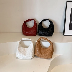 Minimalist woven hobo shoulder bags in red, black, white, and tan leather colors
