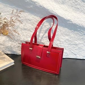 Retro red patent leather rectangular shoulder bag with glossy finish and metal hardware