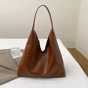 Minimalist large capacity brown tote bag in soft PU leather with wide shoulder strap