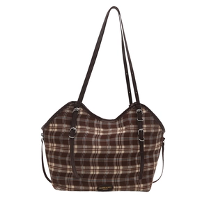 Retro plaid canvas tote bag with brown leather straps and adjustable silver buckles