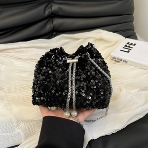 Chic black sequin bucket bag with pearl drawstring and silver chain strap for women