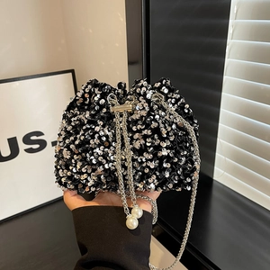 Sparkly sequin bucket bag with silver chain strap and pearl drawstring details