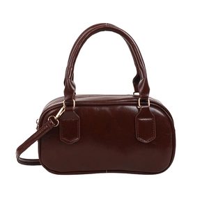 Retro dark brown leather bowling bag with top handles and gold hardware details