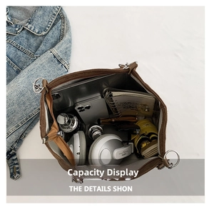 Top view of large capacity tote bag holding tablet, phone, and daily essentials