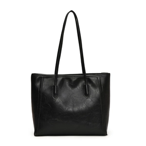 Classic black large capacity tote bag in textured synthetic leather with dual long straps