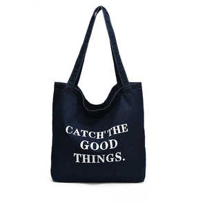 Large dark blue denim tote bag with Catch The Good Things white graphic print