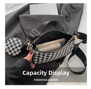 Top view of houndstooth crossbody bag set with wide strap and internal capacity detail