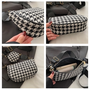 Detail of houndstooth crossbody bag set with golden hardware and interior space view