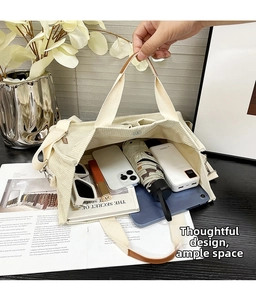 Interior detail of large corduroy tote bag showing spacious capacity for daily items