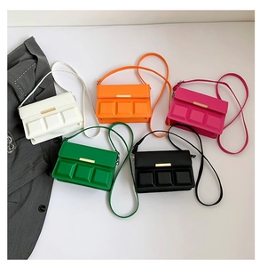 Detailed view of minimalist crossbody bags in five colors with quilted textures