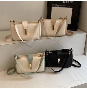 Detailed display of four textured crossbody bags in white, beige, green, and black leather