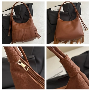 Detalles macro del bolso de cuero granulado marrón y elegantes elementos de flecos