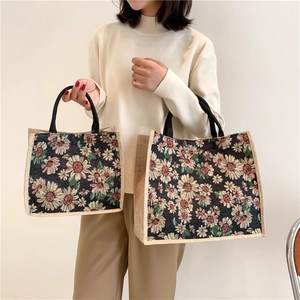 Comparison of large and small floral jacquard tote bags with striped texture details