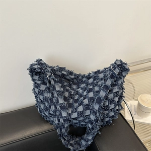Large denim plaid hobo shoulder bag with frayed edges and tassel details for women