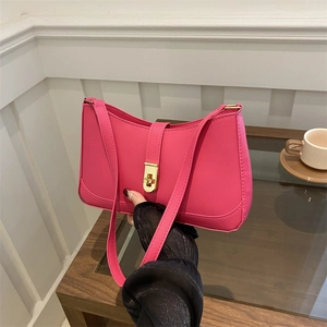 Chic rose red baguette underarm bag with gold twist lock and premium PU leather finish