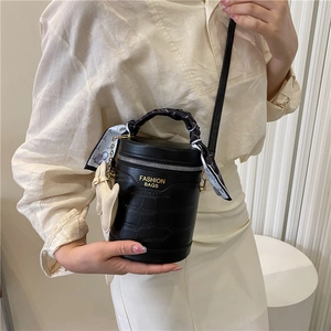 Fashionable black crocodile pattern cylinder handbag with silk scarf and heart pendant
