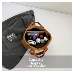 Spacious brown corduroy tote bag showing large capacity for tablet and daily essentials
