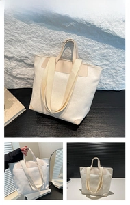 Macro shot of white corduroy tote bag showing textured fabric and dual strap structure