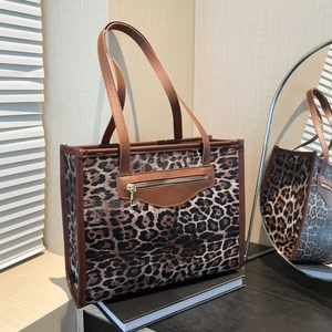 Retro leopard print tote bag with brown leather straps and front zipper pocket