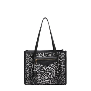 Large leopard print tote bag with black straps and decorative front zipper pocket