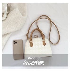 Quilted off-white shell bag featuring brown handles and gold hardware with a size reference