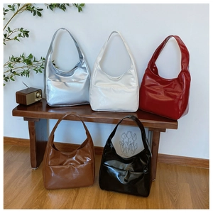 Large vintage Hobo tote bags in five colors including silver, red, and black leather