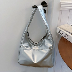 Minimalist silver metallic hobo shoulder bag with large capacity and front pocket