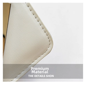 Close-up of white lychee pattern leather with neat stitching and gold hardware detail