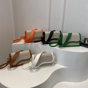 Chic color block canvas handbags in five colors with wavy flap design and wide straps